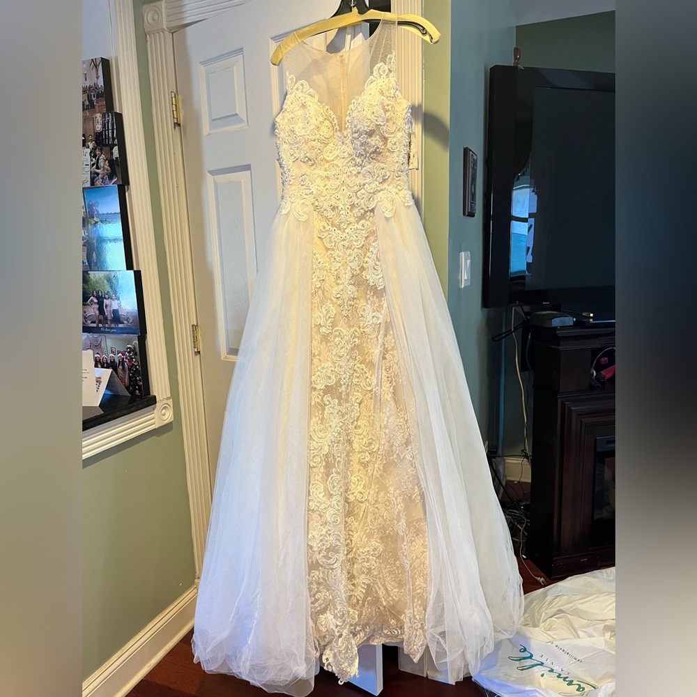 Brand new with tag wedding gown